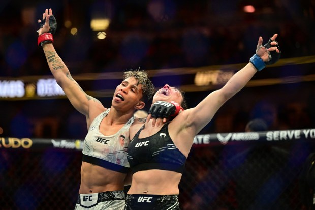 Amanda Lemos, left, and Mackenzie Dern react after their Fight of the Night, which Lemos won via unanimous decision, at UFC 298 on Saturday, Feb. 17, 2024, at Honda Center. (Photo by Hans Gutknecht, Los Angeles Daily News/SCNG)