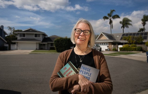 Local novelist and retired postal worker, Mary Camarillo, writes about life in Southern neighborhoods. She is pictured in Huntington Beach on Wednesday, Feb. 21, 2024. (Photo by Mindy Schauer, Orange County Register/SCNG)