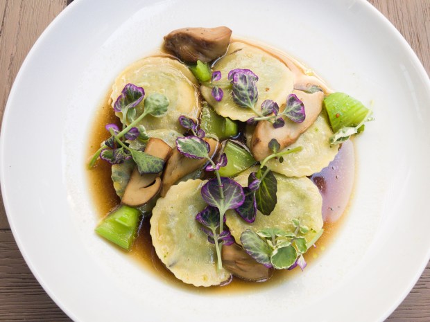 Ravioli stuffed with wild Burgundy snails served in a porcini mushroom broth at Knife Pleat in Costa Mesa (Photo by Brad A. Johnson, Orange County Register/SCNG)