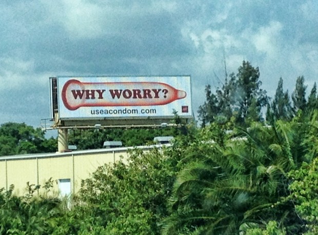 An AIDS Healthcare Foundation billboard off the 95 Freeway in Florida depicts a condom and directs people to the website useacondom.com. (File photo by Scott Travis, South Florida Sun Sentinel)