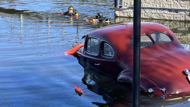 A 1939 Packard that rolled into the lake from a boat launch ramp in Canyon Lake on April 9, 2024, is pulled from the water. (Courtesy of Canyon Lake Fire Department)