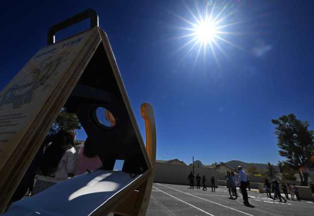 The moon's shadow is cast down from a sunspotter device during the solar eclipse at Shadow Hills Elementary School in Fontana on Monday, April 8, 2024. (Photo by Will Lester, Inland Valley Daily Bulletin/SCNG)
